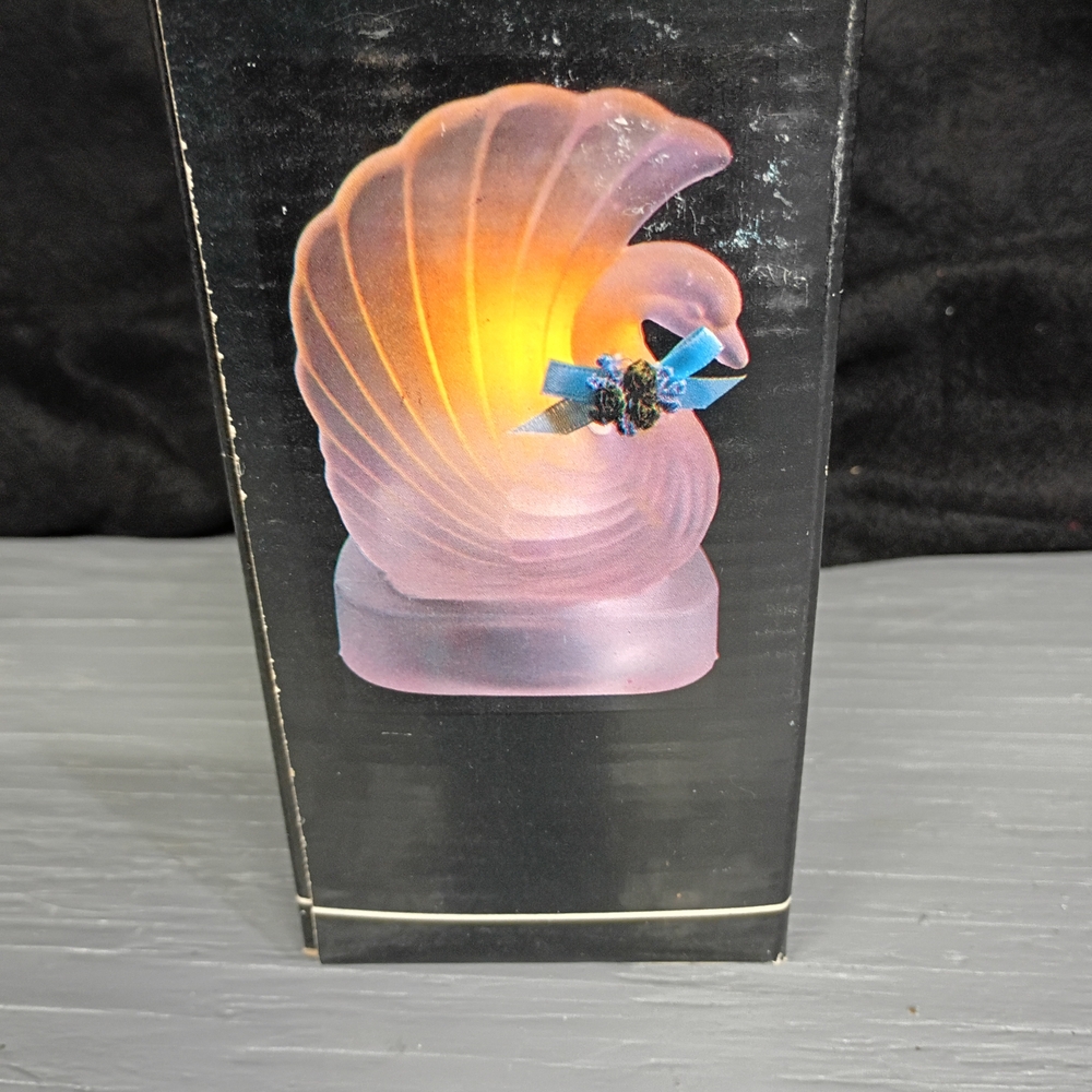 Elegant Frosted Glass Swan with Blue Ribbon Accent